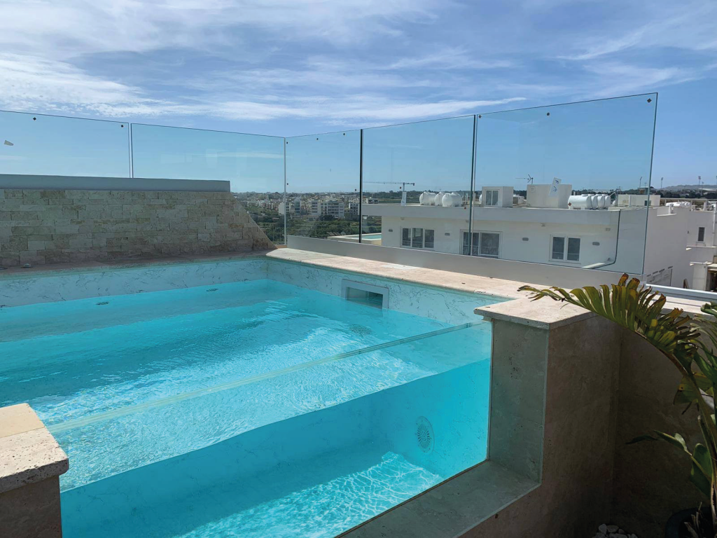 photo: a roof pool installed by Caprice Ltd through the use of strengthened glass